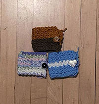 an image of crocheted mug cozies